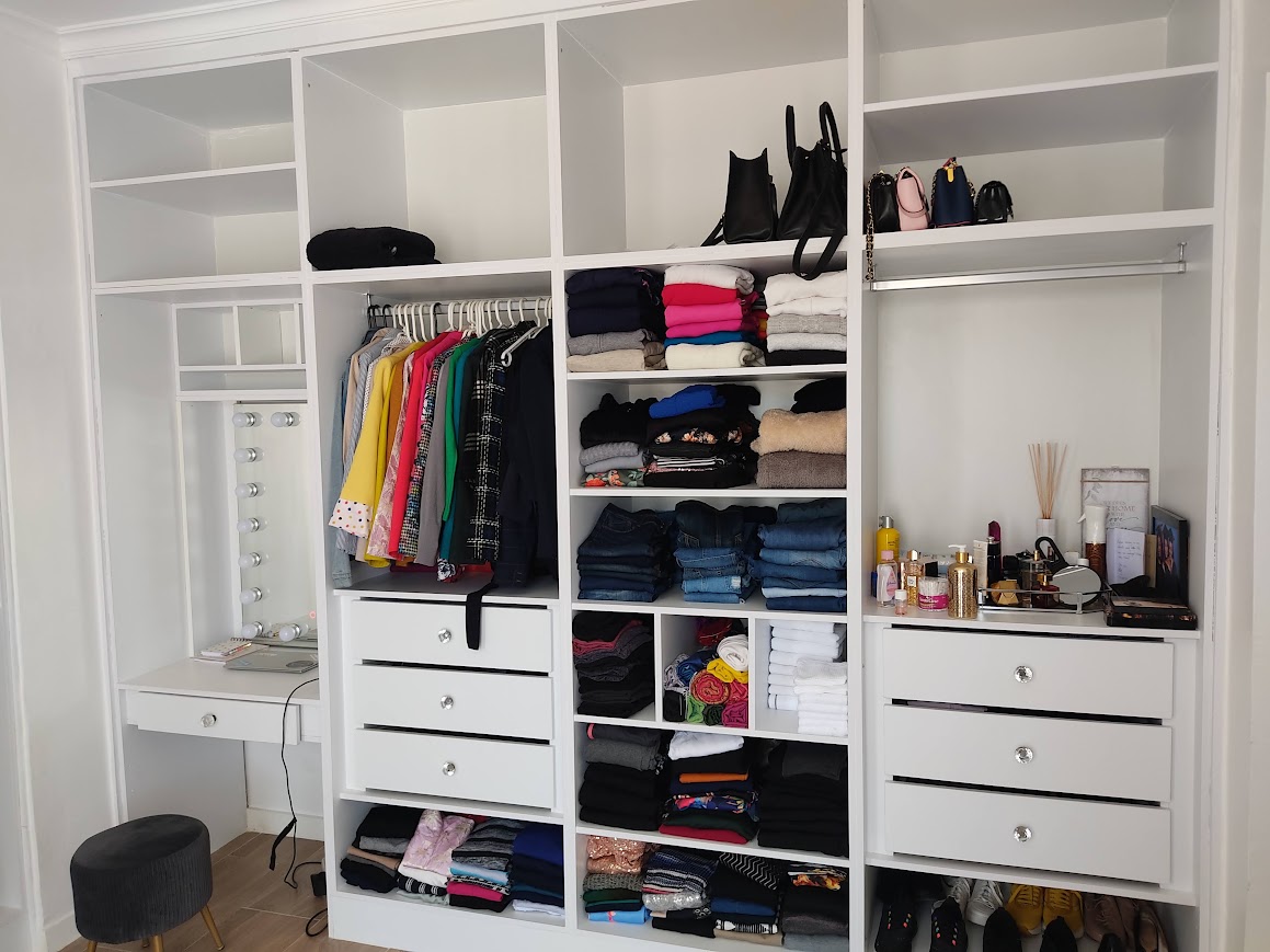 Walk-in closet and dressing room at Northcote Apartments by WDI Design Studio