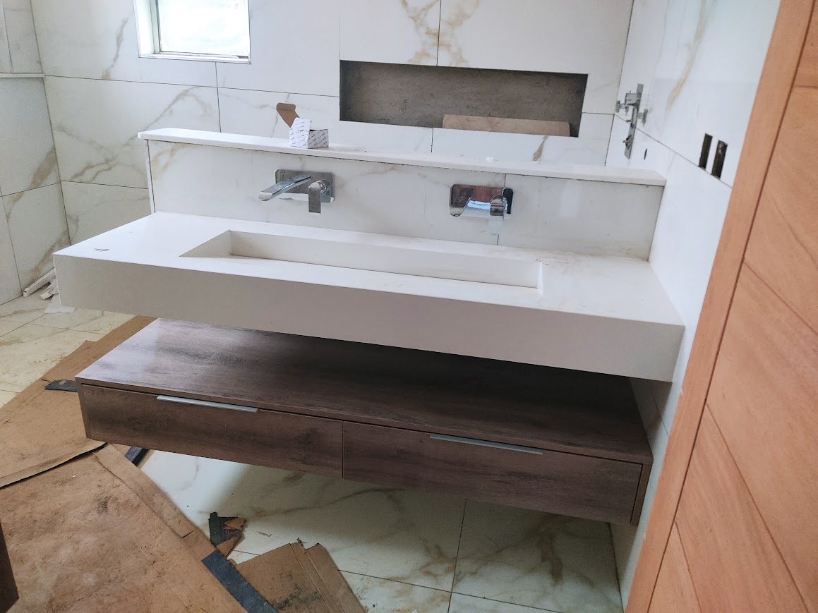 Floating quartz double basin bathroom vanity in Karen